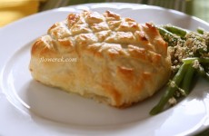 Salmon with herb butter in puff pastry